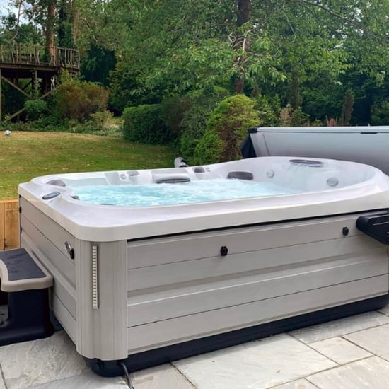 Outdoor vs. Indoor Hot Tubs Pros and Cons - Hot Spring Spas